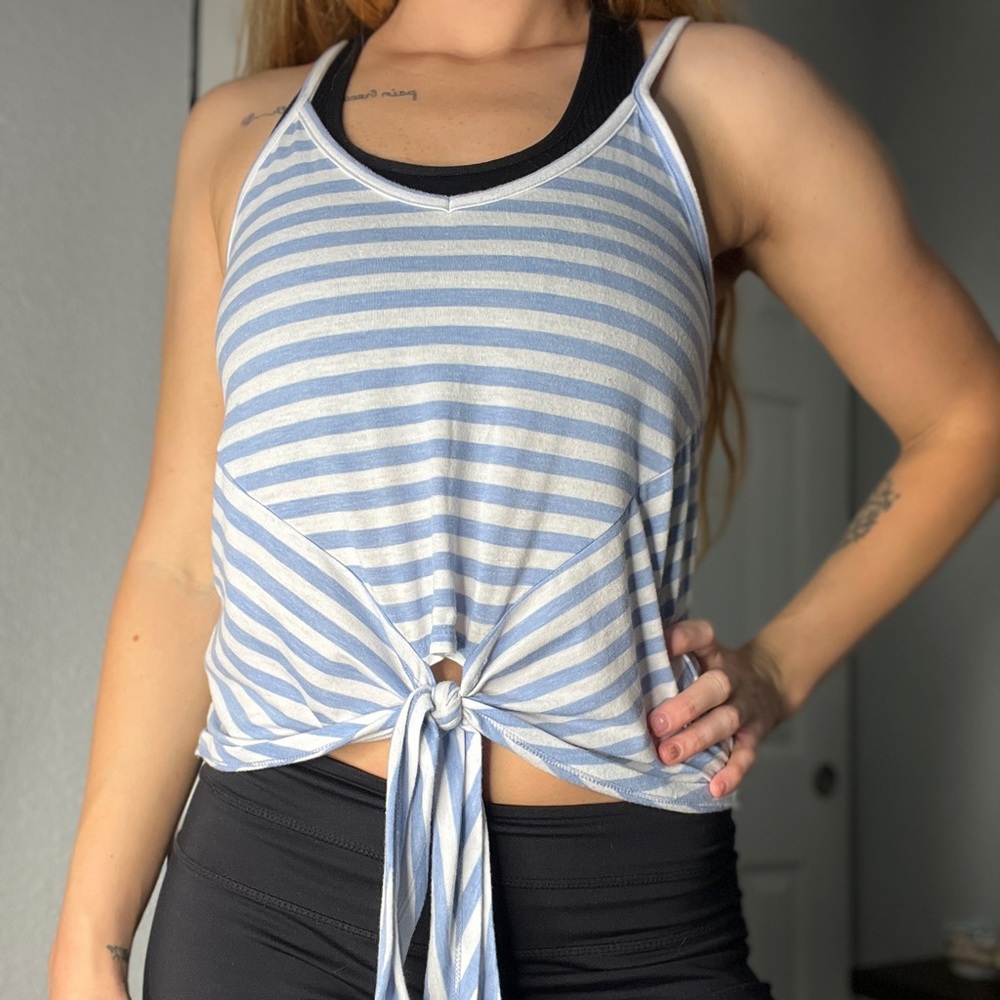 Blue and white striped slightly cropped top. Cute tie style in the front.